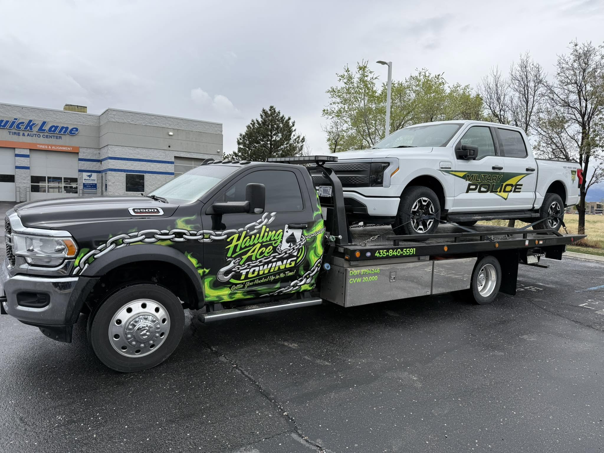 Hauling Ace Towing hauling a Military Police electric F-150 Lightning