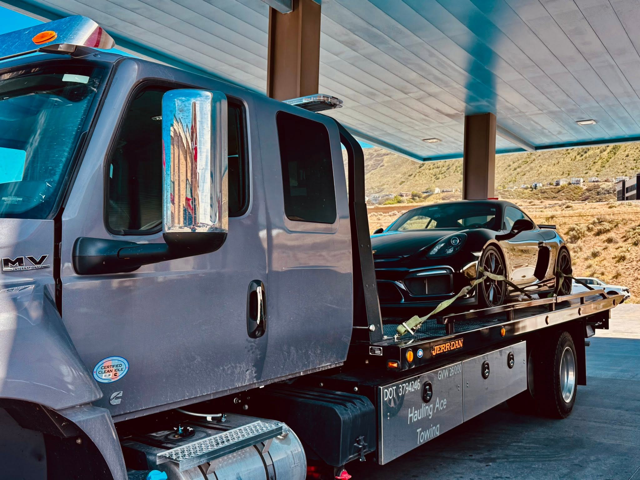 Porsche strapped down on the Hauling Ace Towing flatbed