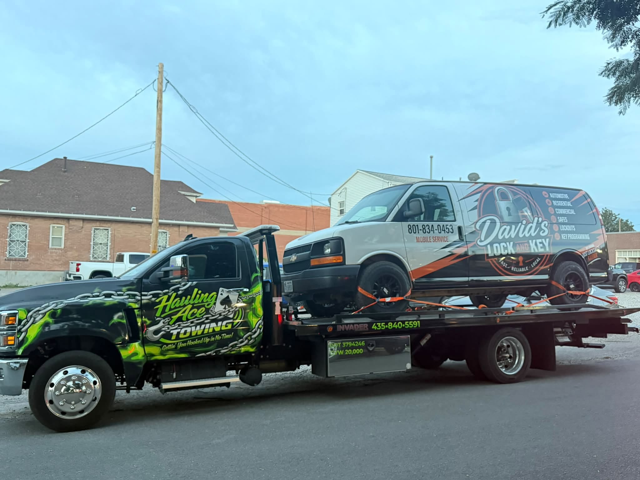 Hauling Ace Towing hauling the David's Lock and Key service van